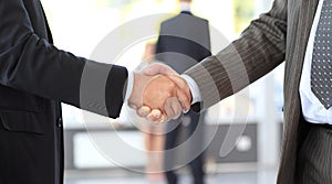 Business men closing deal. handshake