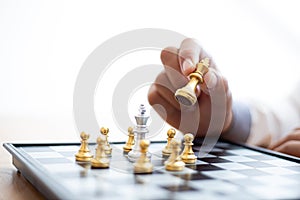 Business men make plans to play chess with Prudence and success