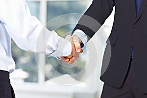 Business men shaking hands photo