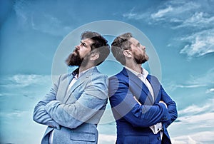 Business men stand blue sky background. Perfect in every detail. Well groomed appearance improves business reputation