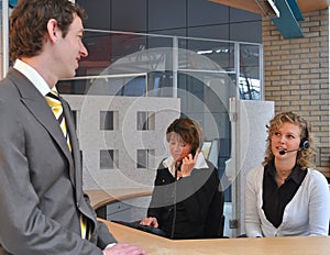 Business men waiting at reception