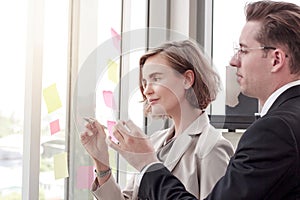 Business men and women are discussing work