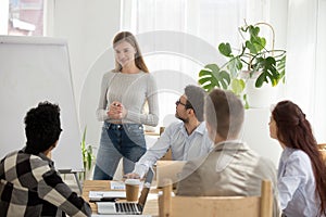 Business millennial team at seminar in office photo