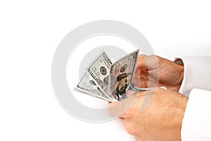 Business Money dollars in the hands on a white background