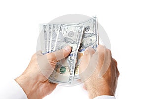 A Business Money dollars in the hands on a white background