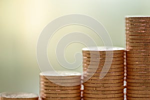 Business, Money, Finance, Security and Saving Background Concept. Close up of unstable stack of gold coins with copy space
