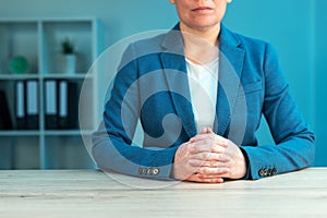 Business negotiation skills with female executive at office desk