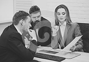 Business negotiations. Business partners, businessmen at meeting, office background. Business negotiations concept