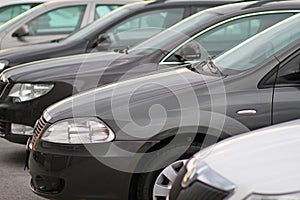 Business new cars parked ona parking in front of motor dealer store