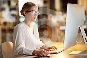 Business, night and woman with computer, typing and data analysis for project, profit growth and focus. Female employee