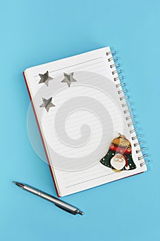 Business notepad for spiral notes, stationery pen and christmas decor for new year holiday