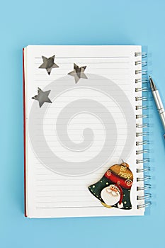Business notepad for spiral notes, stationery pen and christmas decor for new year holiday