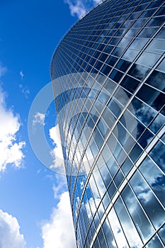 Business office building exterior against blue sky