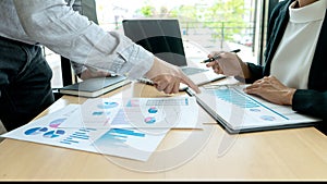 In business office businessman in meeting analyses chart