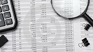 Business office desk closeup - financial reports, analysis and accounting, set of documents, tables and graphs, various items for