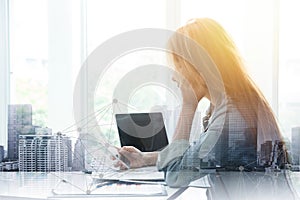 Business office girl playing smartphone with overlay metro building to connect people