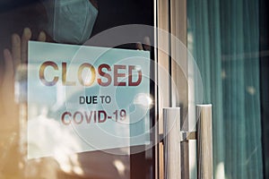 Business office or store shop is closed/bankrupt business due to the effect of novel Coronavirus COVID-19 pandemic. Unidentified
