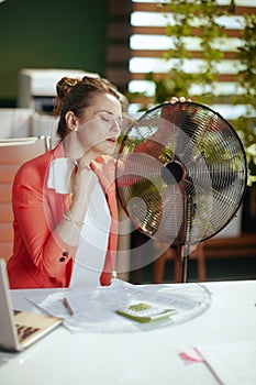 business owner woman at work suffer from heat