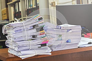 Business papers pile reports