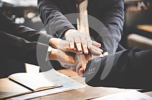 Business partner people joining hand after contract finished meeting