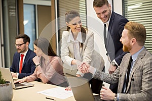 Business partners analyze the business results in modern office