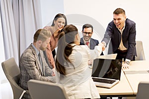 Business partners analyze the business results in modern office