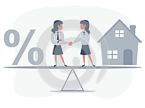 Business partners shaking hands as a symbol of unity. Business people standing on seesaw between house and percent sign