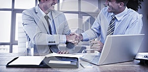 Business partners shaking hands photo