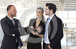 Business partners talking at office