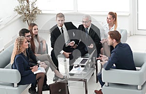 Business partners and business team discussing a new contrac photo