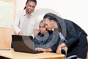 Business partners working on a laptop