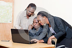 Business partners working on a laptop