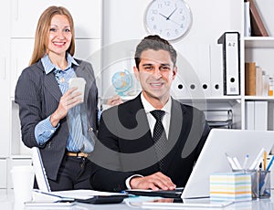 Business partners working in office