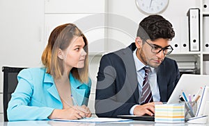 Business partners working in office