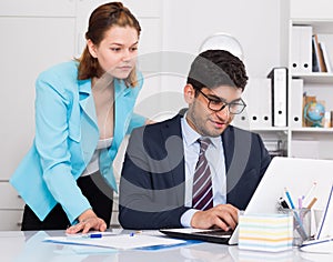 Business partners working in office