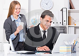 Business partners working in office