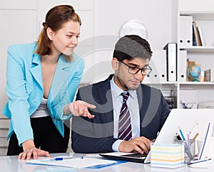 Business partners working in office