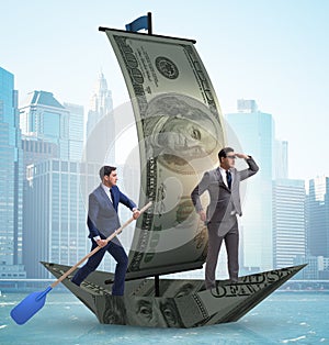 The business partnership with businessmen sailing on dollar boat