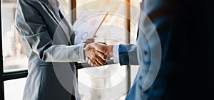 Business partnership handshake concept.Photo two coworkers handshaking process.Successful deal after great meeting