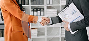 Business partnership handshake concept.Photo two coworkers handshaking process.Successful deal after great meeting