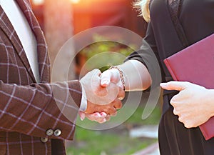 Business partnership handshake concept.Photo two coworkers handshaking process.Successful deal after great meeting.