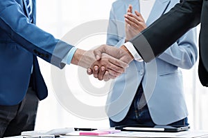 Business partnership meeting concept. Image business people handshake. Successful businessmen handshaking after good