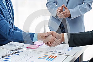 Business partnership meeting concept. Image business people handshake. Successful businessmen handshaking after good