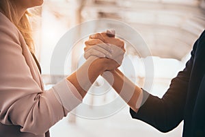 Business partnership meeting trust handshaking concept. Businesswomen doing arm wrestling. Successful business people contract
