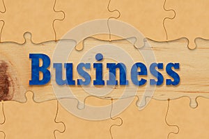 Business partnership and teamwork concept coming together with puzzle pieces