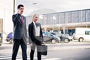 Business people at airport terminal travelling