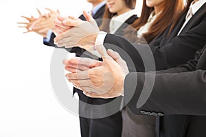 Business people applauding on isolated white background