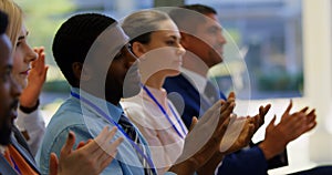 Business people applauding a speech in the business seminar 4k