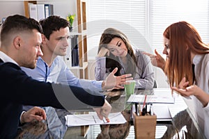 Business People Arguing In Meeting