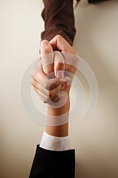 Business people arm wrestling